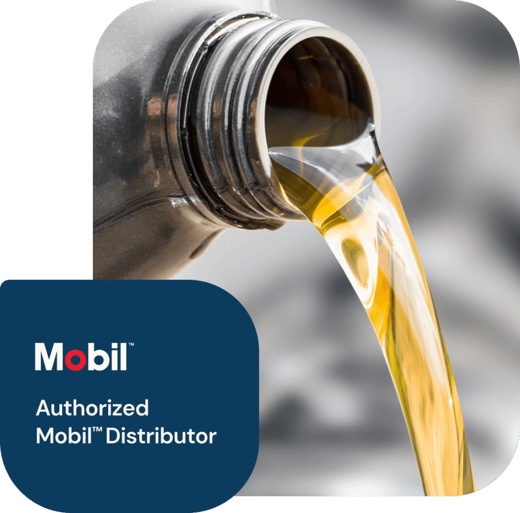 Golden motor oil being poured from a bottle, with a badge in the corner that reads "Mobil™ Authorized Mobil™ Distributor."